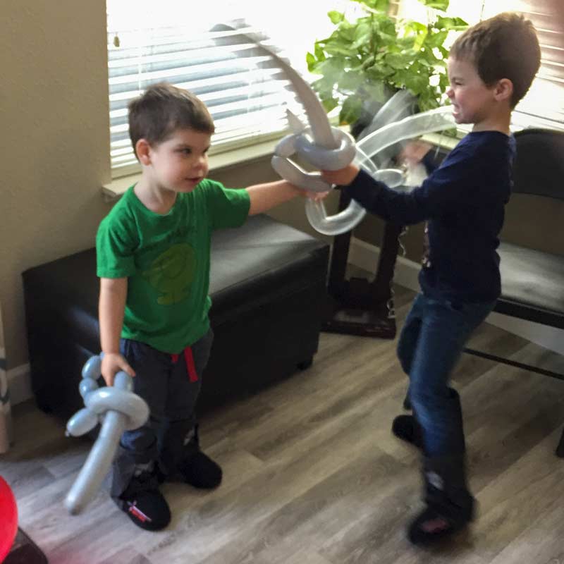 Sword balloons by Auntie Stacey's Face Painting, balloon twisting, children's entertainment, party, kids, clown, fun, wine country face painter (415) 246-1227