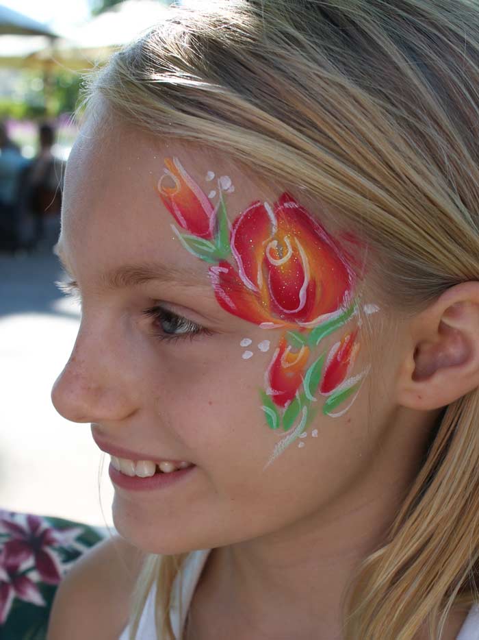 Roses face paint by Auntie Stacey, www.auntiestaceysfacepainting.com