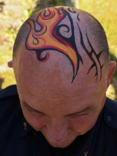 Tribal Fire Head body paint by Auntie Stacey's Face Painting