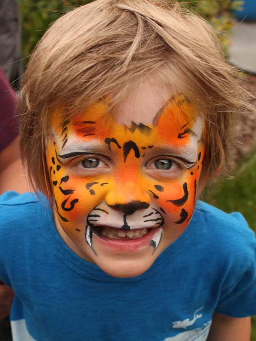 Tiger face paint by Auntie Stacey, Auntie Stacey's Face Painting, Sebastopol, CA