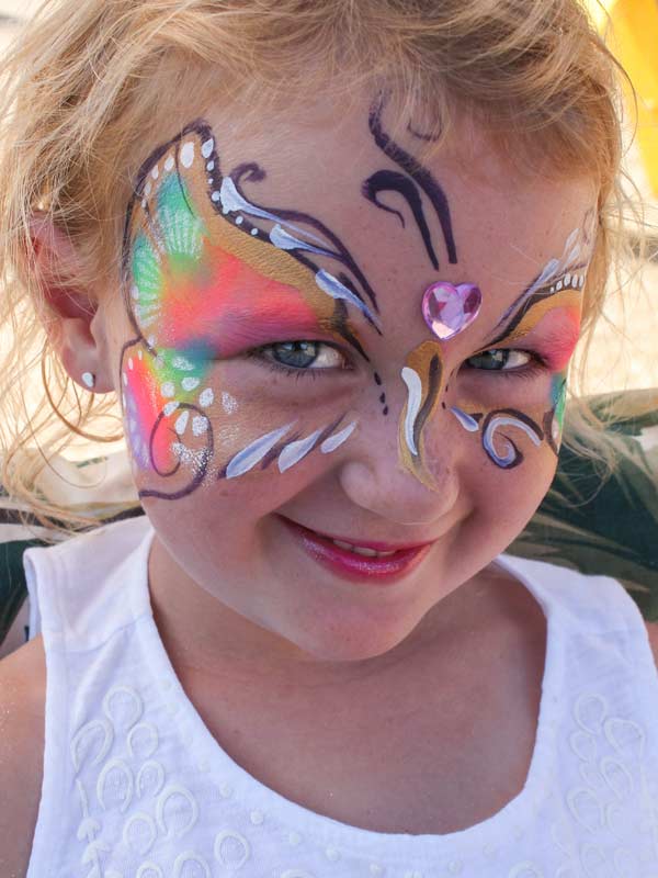 Rainbow Butterfly with gem by Auntie Stacey's Face Painting, sdennick@comcast.net, Sonoma, Marin county, SF Bay area