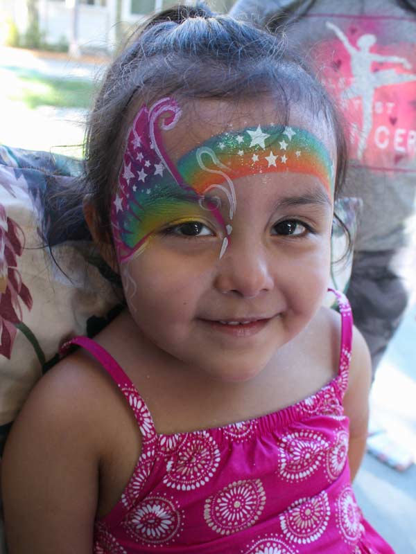 Rainbow Butterfly by www.auntiestaceysfacepainting.com SF Bay area face painter Auntie Stacey Dennick best face painter Marin county