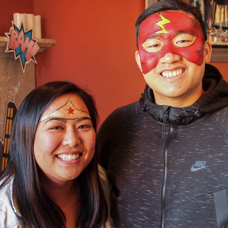 Wonder Woman & The Flash face paint by Auntie Stacey's Face Painting, Sonoma county, Santa Rosa, Sebastopol, Petaluma, wine country face painter, SF bay area face painter, Wine Country face painter