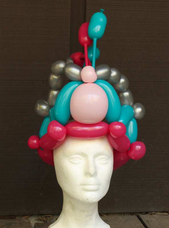 Pink and blue balloon crown by Auntie Stacey's Face Painting, balloon twisting, children's entertainment, party, kids, clown, fun, wine country face painter (415) 246-1227