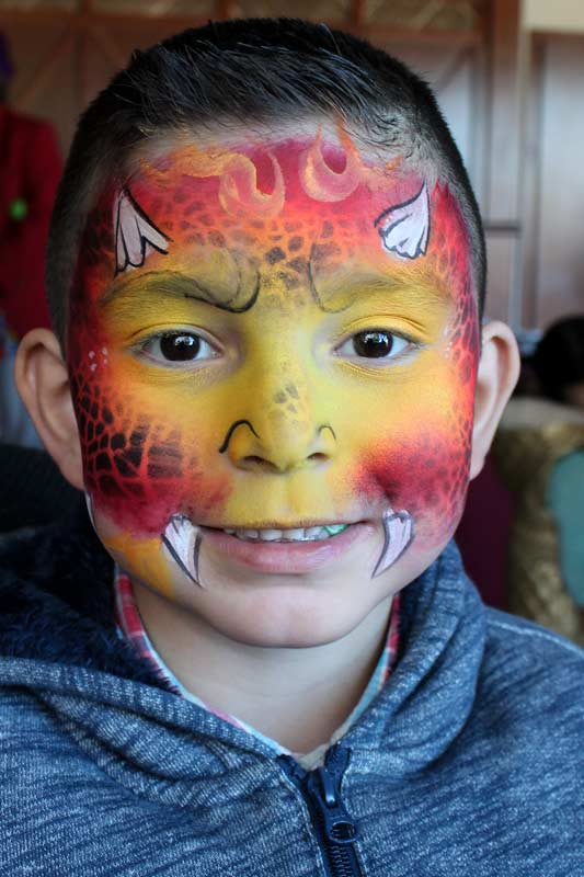 Fire Dragon face paint by Auntie Stacey's Face Painting, balloon twisting, children's entertainment, party, kids, clown, fun, wine country face painter (415) 246-1227