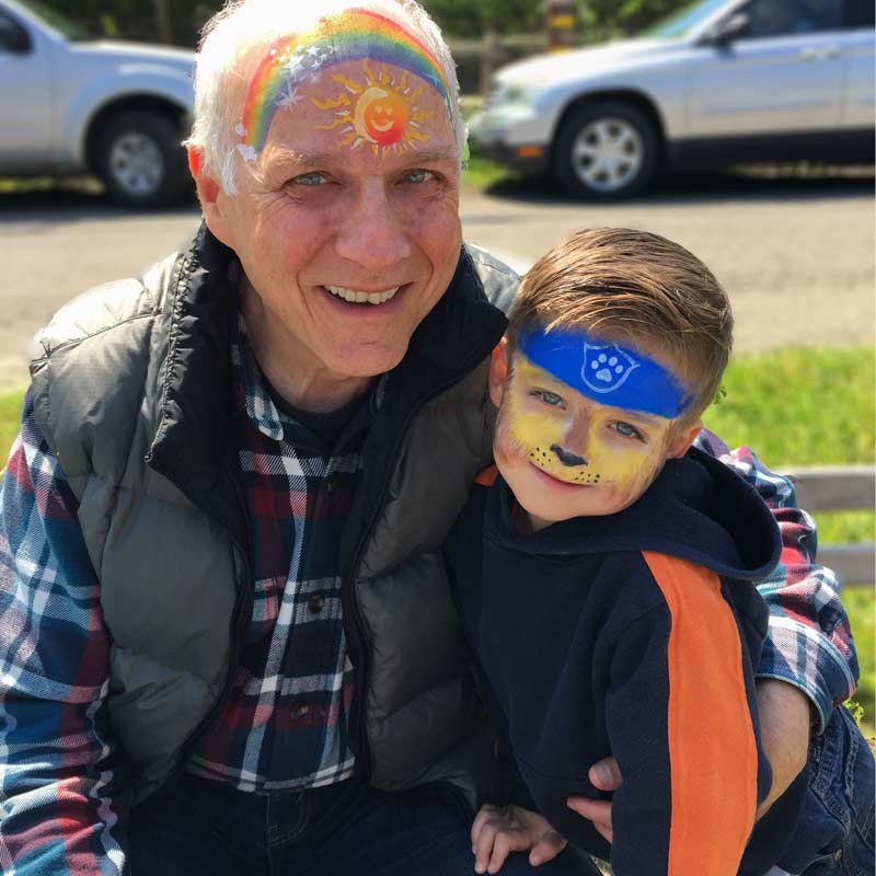Grandpa with Chase from Paw Patrol by Auntie Stacey's Face painting, Santa Rosa, SF Bay area, balloons, children's entertainment