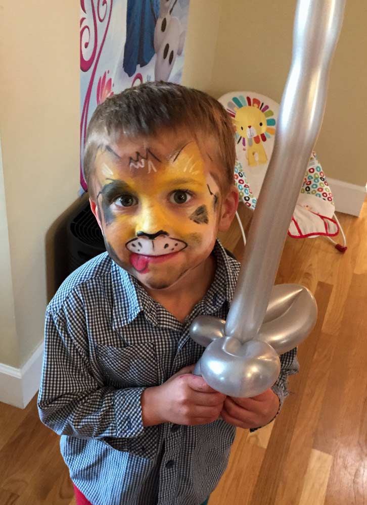 Dog with balloon sword by Auntie Stacey's Face painting balloon twisting San Francisco bay area, Marin, Sonoma, Santa Rosa, San Rafael, children's entertainment