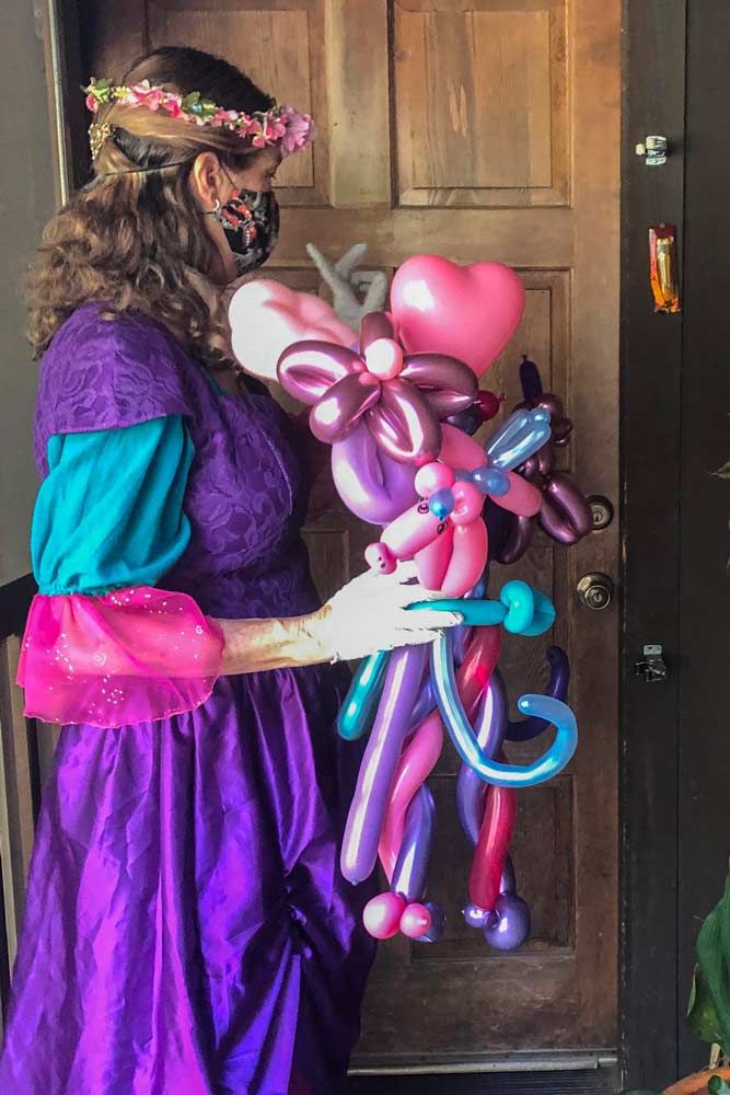 Princess delivers balloons By Auntie Stacey's Face Painting