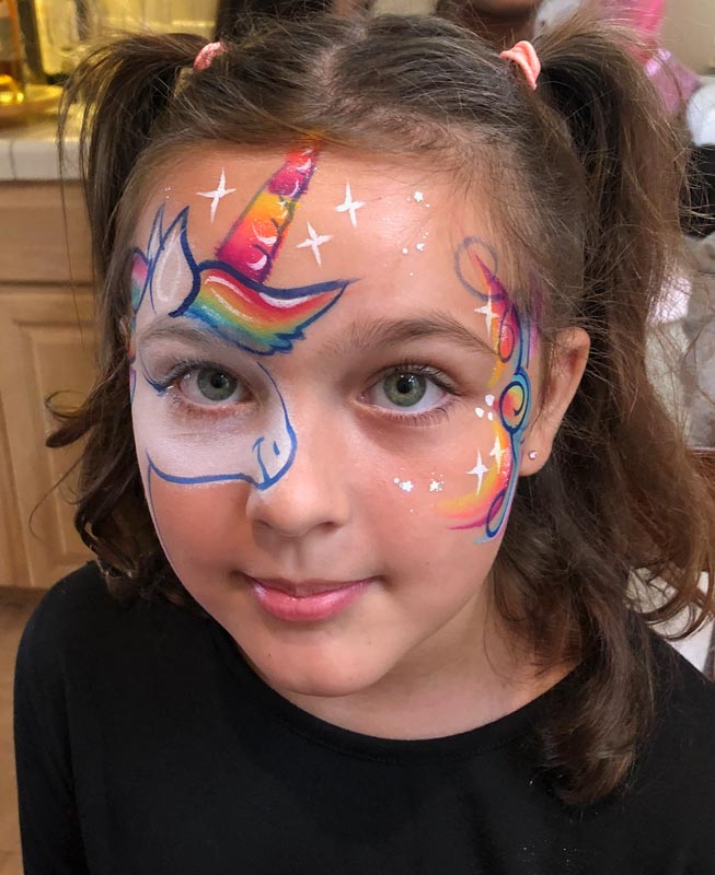Unicorn face paint by Auntie Stacey's Face Painting, N. California